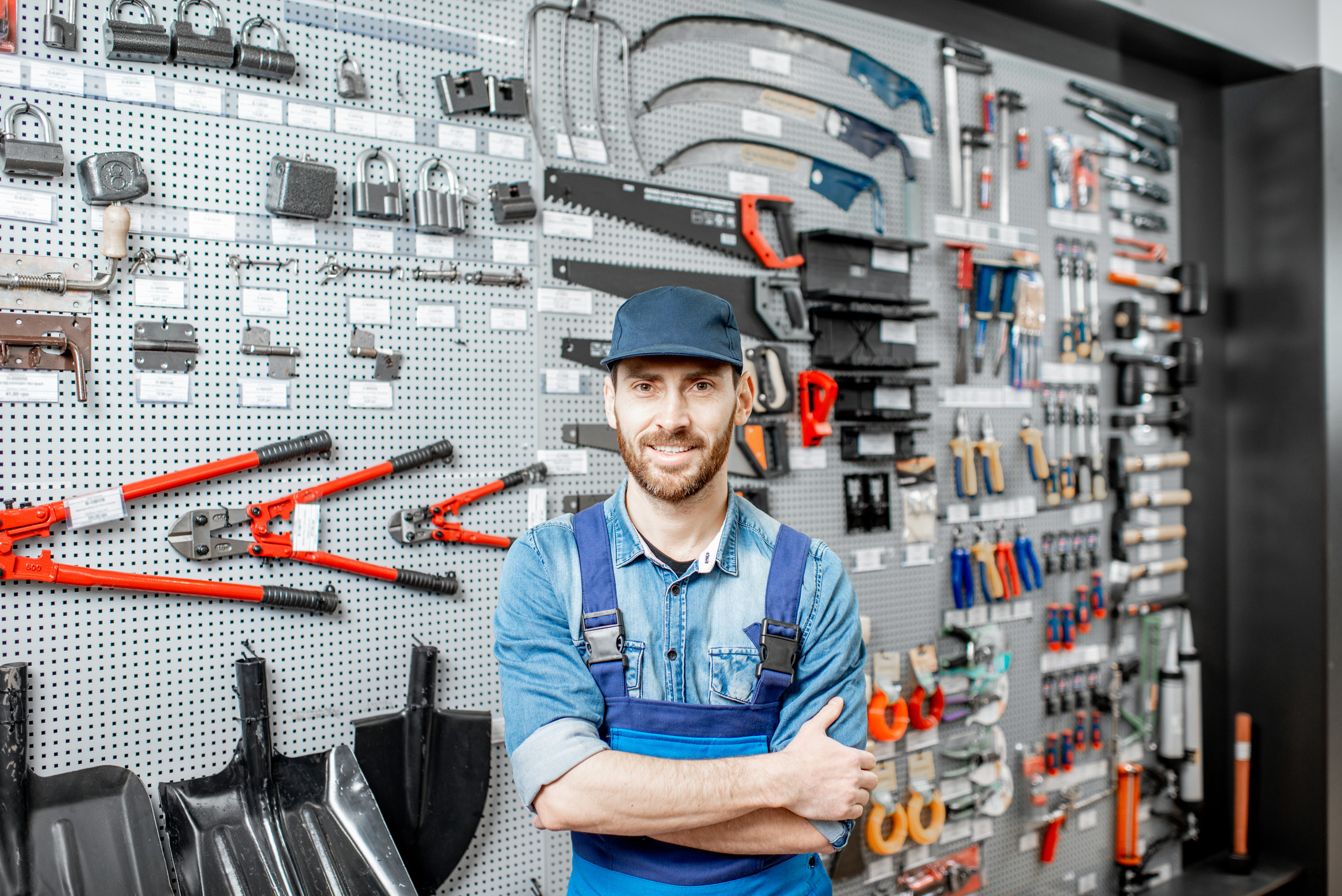 Worker in the Shop with Building Tools